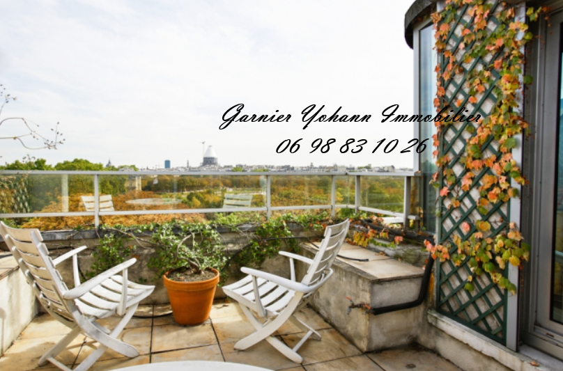 Propriété de Prestige au Cœur d'un Immeuble Parisien Emblématique